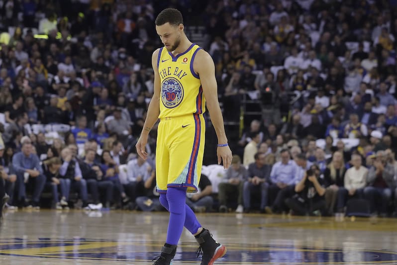 Golden State Warriors guard Stephen Curry (30) walks on the court to shoot free throws during the first half of an NBA basketball game against the San Antonio Spurs in Oakland, Calif., Thursday, March 8, 2018. (AP Photo/Jeff Chiu)