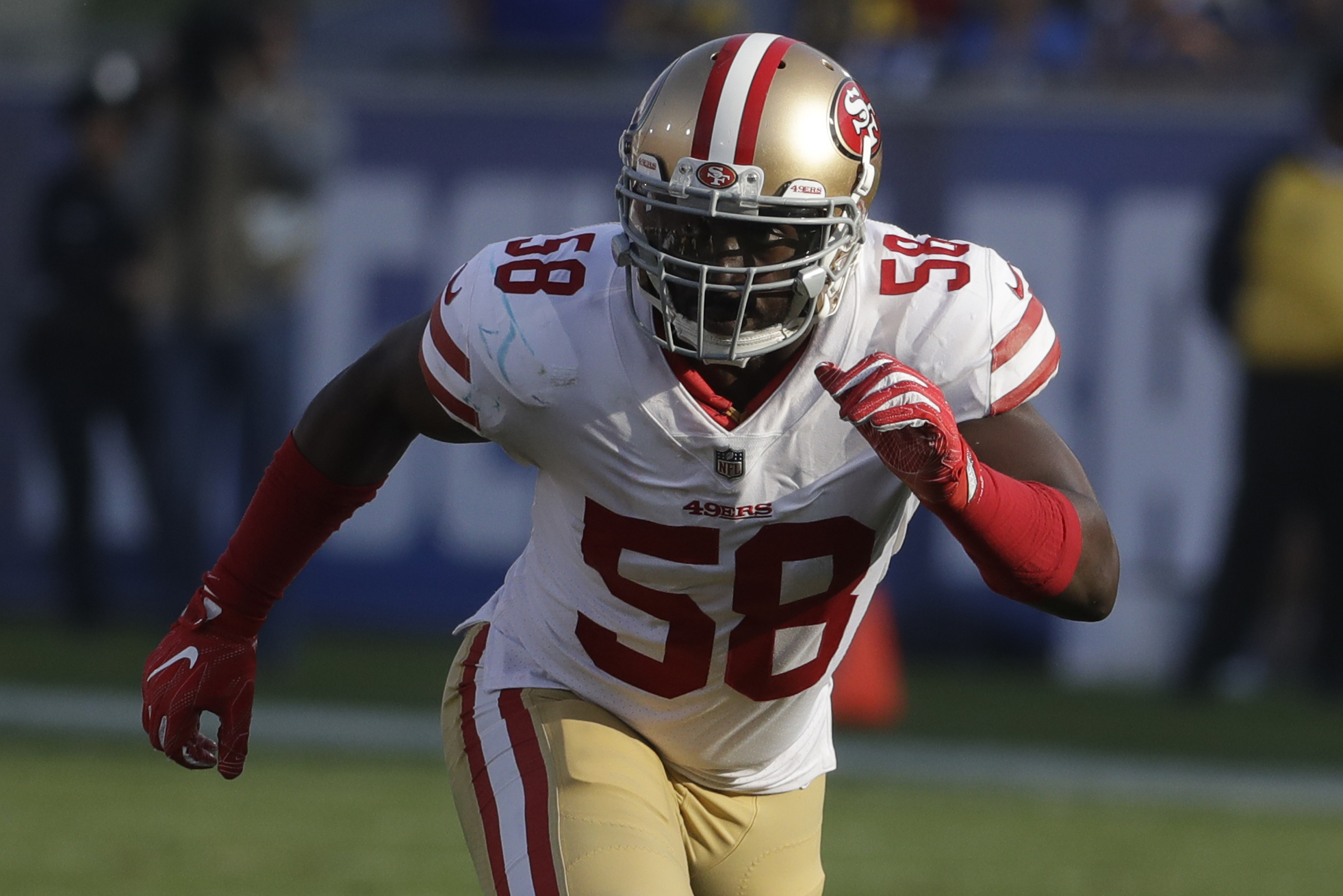 49ers make Elvis Dumervil signing official