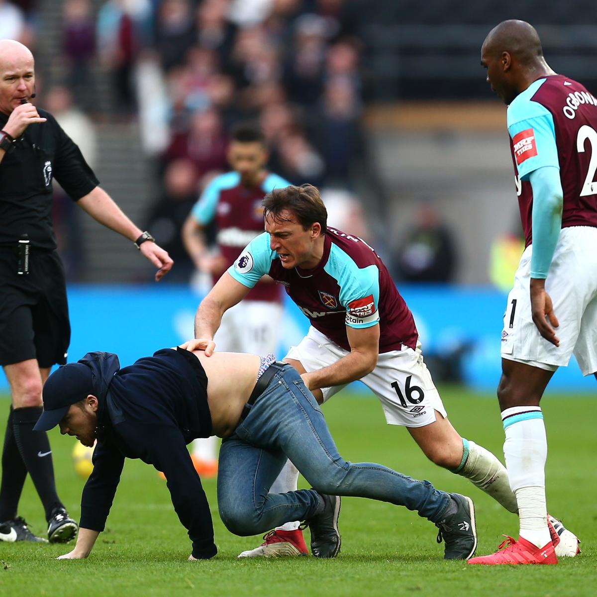 West Ham Fans Invade Pitch, Confront Players During Loss ...