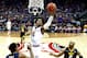 KANSAS CITY, MO - MARCH 10: Devonte' Graham #4 of the Kansas Jayhawks drives toward the basket as Sagaba Konate #50 and Jevon Carter #2 of the West Virginia Mountaineers defend during the Big 12 Basketball Tournament Championship game at Sprint Center on March 10, 2018 in Kansas City, Missouri. (Photo by Jamie Squire/Getty Images)