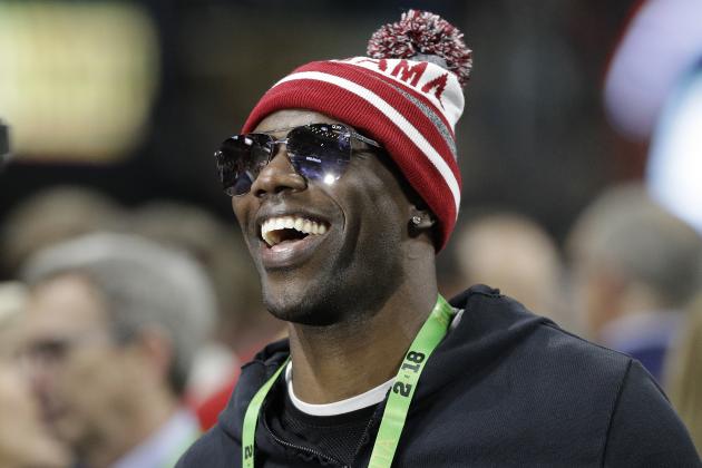 Terrell Owens smiles before the NCAA college football playoff championship game between Georgia and Alabama, Monday, Jan. 8, 2018, in Atlanta. (AP Photo/David J. Phillip)