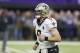 New Orleans Saints quarterback Drew Brees (9) warms up before an NFL divisional football playoff game against the Minnesota Vikings in Minneapolis, Sunday, Jan. 14, 2018. (AP Photo/Jim Mone)