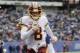 Washington Redskins quarterback Kirk Cousins (8) rushes for a touchdown during the first half of an NFL football game against the New York Giants Sunday, Dec. 31, 2017, in East Rutherford, N.J. (AP Photo/Mark Lennihan)
