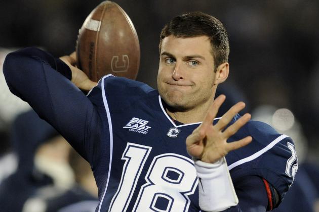 Connecticut quarterback Johnny McEntee (18) warms up during the second half of an NCAA college football game at Rentschler Field in East Hartford, Conn., Saturday, Dec. 1, 2012. (AP Photo/Jessica Hill)