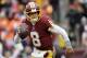 Washington Redskins quarterback Kirk Cousins scrambles during an NFL football game against the Denver Broncos, Sunday, Dec. 24, 2017, in Landover, Md. (AP Photo/Mark Tenally)