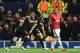 Sevilla's French forward Wissam Ben Yedder (C) celebrates with Sevilla's Spanish midfielder Pablo Sarabia after scoring during a last 16 second leg UEFA Champions League football match between Manchester United and Sevilla at Old Trafford in Manchester, northwest England on March 13, 2018. / AFP PHOTO / Oli SCARFF (Photo credit should read OLI SCARFF/AFP/Getty Images)