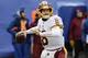 FILE - In this Dec. 31, 2017, file photo, Washington Redskins quarterback Kirk Cousins (8) throws a pass during the first half of an NFL football game against the New York Giants, in East Rutherford, N.J. The NFL's offseason features plenty of intrigue beyond where Kirk Cousins and dozens of other quarterbacks will land. (AP Photo/Bill Kostroun, File)