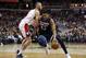 Minnesota Timberwolves center Karl-Anthony Towns (32) drives against Washington Wizards center Marcin Gortat (13), from Poland, during the first half of an NBA basketball game, Tuesday, March 13, 2018, in Washington. (AP Photo/Alex Brandon)