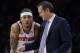 New York Knicks head coach Jeff Hornacek talks to Michael Beasley (8) in the first half of an NBA basketball game against the Philadelphia 76ers, Monday, Feb 12, 2018, in Philadelphia. (AP Photo/Michael Perez)