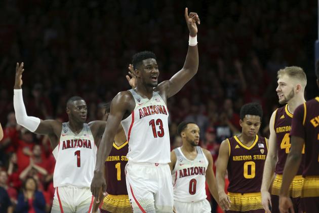 Arizona's Deandre Ayton (13) celebrate during the final seconds of their 84-78 victory over 3rd ranked Arizona State during an NCAA college basketball game, Saturday, Dec. 30, 2017, in Tucson, Ariz. (AP Photo/Ralph Freso)