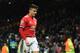 Manchester United's Chilean striker Alexis Sanchez leaves the pitch after losing a last 16 second leg UEFA Champions League football match between Manchester United and Sevilla at Old Trafford in Manchester, northwest England on March 13, 2018. / AFP PHOTO / Oli SCARFF (Photo credit should read OLI SCARFF/AFP/Getty Images)
