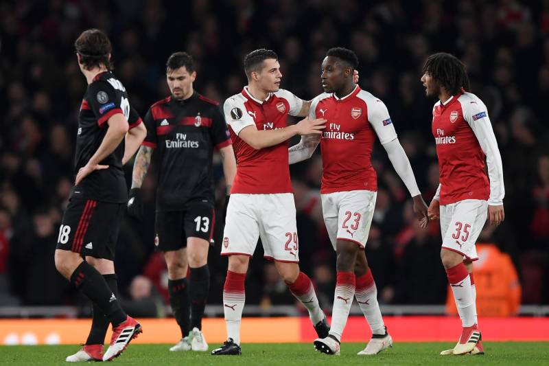 LONDON, ENGLAND - MARCH 15: Granit Xhaka of Arsenal celebrates scoring the second goal with Danny Welbeck during the UEFA Europa League Round of 16 Second Leg match between Arsenal and AC Milan at Emirates Stadium on March 15, 2018 in London, England. (Photo by Shaun Botterill/Getty Images)