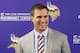 Minnesota Vikings new quarterback Kirk Cousins addresses the media after he was introduced during a news conference, after signing a three-year, $84 million contract, at the NFL football team's new headquarters Thursday, March 15, 2018, in Eagan, Minn. (AP Photo/Jim Mone)