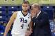 FILE - In this Nov. 14, 2016, file photo, Pittsburgh head coach Kevin Stallings, right, talks to forward Ryan Luther (4), during the first half of an NCAA college basketball game against Gardner-Webb, in Pittsburgh. Pittsburgh enters its second season under Stallings with a completely retooled roster, with Luther being one of only two scholarship team members returning from last season. The other being Jonathan Milligan. The new-look Panthers have been picked to finish last in the ACC. (AP Photo/Fred Vuich, FILE)