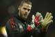 Manchester United goalkeeper David de Gea applauds the fans as he takes part in the warm up prior to the start of the Champions League round of 16 second leg soccer match between Manchester United and Sevilla, at Old Trafford in Manchester, England, Tuesday, March 13, 2018. (AP Photo/Dave Thompson)