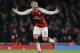 Arsenal's Jack Wilshere shouts during the English League Cup semifinal second leg soccer match between Chelsea and Arsenal at the Emirates stadium in London, Wednesday, Jan.24, 2018. (AP Photo/Matt Dunham)