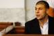 NORTH ATTLEBORO, MA - AUGUST 22: Aaron Hernandez sits in the courtroom of the Attleboro District Court during his hearing on August 22, 2013 in North Attleboro, Massachusetts. Former New England Patriot Aaron Hernandez has been indicted on a first-degree murder charge for the death of Odin Lloyd. (Photo by Jared Wickerham/Getty Images)
