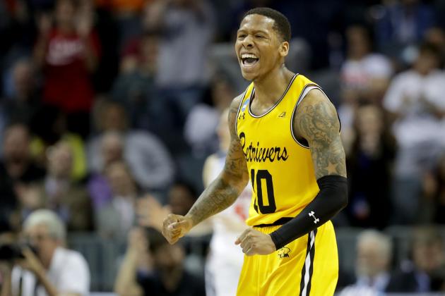 CHARLOTTE, NC - MARCH 16:  Jairus Lyles #10 of the UMBC Retrievers reacts after a score against the Virginia Cavaliers in the second half during the first round of the 2018 NCAA Men's Basketball Tournament at Spectrum Center on March 16, 2018 in Charlotte, North Carolina.  (Photo by Streeter Lecka/Getty Images)
