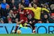 Liverpool's Egyptian midfielder Mohamed Salah (L) vies with Watford's Uruguayan defender Miguel Britos during the English Premier League football match between Liverpool and Watford at Anfield in Liverpool, north west England on March 17, 2018. / AFP PHOTO / Lindsey PARNABY / RESTRICTED TO EDITORIAL USE. No use with unauthorized audio, video, data, fixture lists, club/league logos or 'live' services. Online in-match use limited to 75 images, no video emulation. No use in betting, games or single club/league/player publications. / (Photo credit should read LINDSEY PARNABY/AFP/Getty Images)