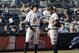 New York Yankees' Aaron Judge, left, talks with Baltimore Orioles third baseman Manny Machado during the eighth inning of a baseball game at Yankee Stadium, Sunday, Sept. 17, 2017, in New York. (AP Photo/Seth Wenig)