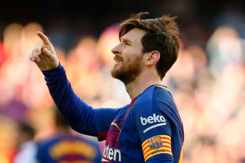 Barcelona's Argentinian forward Lionel Messi celebrates after scoring during the Spanish League football match between FC Barcelona and Athletic Club Bilbao at the Camp Nou stadium in Barcelona on March 18, 2018. / AFP PHOTO / Pau Barrena        (Photo credit should read PAU BARRENA/AFP/Getty Images)