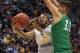 SAN DIEGO, CA - MARCH 18: Jevon Carter #2 of the West Virginia Mountaineers shoots against Ajdin Penava #11 of the Marshall Thundering Herd in the first half during the second round of the 2018 NCAA Men's Basketball Tournament at Viejas Arena on March 18, 2018 in San Diego, California. (Photo by Sean M. Haffey/Getty Images)