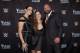 IMAGE DISTRIBUTED FOR WWE - WWE Chief Brand Officer Stephanie McMahon, left, Ronda Rousey, center, and WWE EVP of Talent, Live Events and Creative Paul