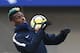 France's midfielder Paul Pogba controls the ball during a training session in Clairefontaine-en-Yvelines, southwest of Paris, on March 19, 2018, as part of the team's preparation for the friendly football matches against Colombia and Russia. / AFP PHOTO / FRANCK FIFE (Photo credit should read FRANCK FIFE/AFP/Getty Images)