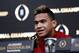 Alabama quarterback Tua Tagovailoa speaks at a press conference in Atlanta, Tuesday, Jan. 9, 2018. Alabama beat Georgia 26-23 in overtime to win the NCAA college football playoff championship game on Monday night. (AP Photo/David Goldman)