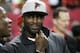 FILE - In this Jan. 1, 2017, file photo, former Atlanta Falcons quarterback Michael Vick stands on the sidelines before NFL football game between the Falcons and the New Orleans Saints in Atlanta. Vick told Fox Sports 1 Monday, July 17, 2017, that former San Francisco 49ers quarterback Colin Kaepernick should get a haircut in order to