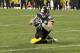 Pittsburgh Steelers tight end Jesse James (81) catches a pass then twists to stretch the ball into the end zone for a touchdown against the New England Patriots with seconds remaining in the fourth quarter of an NFL football game in Pittsburgh, Sunday, Dec. 17, 2017. Upon video review, the touchdown call was reversed and the pass was ruled incomplete. The Patriots held on to win 27-24. (AP Photo/Don Wright)