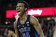 FILE - In this Dec. 9, 2017, file photo, Duke's Wendell Carter Jr. reacts after scoring during the second half of an NCAA college basketball game against Boston College, in Boston. Bank records and other expense reports that are part of a federal probe into college basketball list a wide range of impermissible payments from agents to at least two dozen players or their relatives, according to documents obtained by Yahoo Sports. Yahoo said Friday, Feb. 23, 2018, that the documents obtained in discovery during the investigation link current players including Michigan State's Miles Bridges, Duke's Wendell Carter and Alabama's Collin Sexton to potential benefits that would be violations of NCAA rules. (AP Photo/Michael Dwyer, File)
