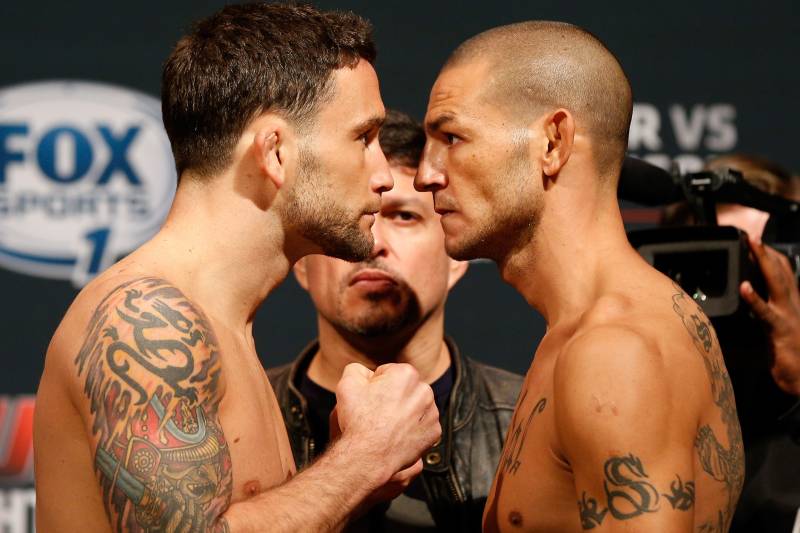 AUSTIN, TX - NOVEMBER 21: (L-R) Opponents Frankie Edgar and Cub Swanson face off during the UFC weigh-in at The Frank Erwin Center on November 21, 2014 in Austin, Texas. (Photo by Josh Hedges/Zuffa LLC/Zuffa LLC via Getty Images)
