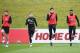 BURTON-UPON-TRENT, ENGLAND - MARCH 22: (L-R) James Tarkowski, Lewis Cook, Harry Maguire and Joe Gomez warm up during an England training session on the eve of their international friendly against the Netherlands at St Georges Park on March 22, 2018 in Burton-upon-Trent, England. (Photo by Gareth Copley/Getty Images)
