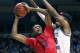 Dayton's Kostas Antetokounmpo (13) goes up to shoot against Rhode Island's Cyril Langevine (10) during the first half of an NCAA college basketball game in South Kingstown, R.I., Friday, Feb. 23, 2018. (AP Photo/Michael Dwyer)