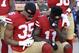 San Francisco 49ers safety Eric Reid (35) and wide receiver Marquise Goodwin (11) kneel during the performance of the national anthem before an NFL football game against the New York Giants in Santa Clara, Calif., Sunday, Nov. 12, 2017. (AP Photo/Marcio Jose Sanchez)