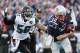FOXBOROUGH, MA - JANUARY 21: Tom Brady #12 of the New England Patriots is pursued by Dante Fowler Jr. #56 of the Jacksonville Jaguars in the first quarter during the AFC Championship Game at Gillette Stadium on January 21, 2018 in Foxborough, Massachusetts. (Photo by Elsa/Getty Images)