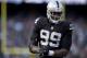 OAKLAND, CA - NOVEMBER 15: Aldon Smith #99 of the Oakland Raiders looks on during a timeout against the Minnesota Vikings in the third quarter of their NFL football game at O.co Coliseum on November 15, 2015 in Oakland, California. (Photo by Thearon W. Henderson/Getty Images)
