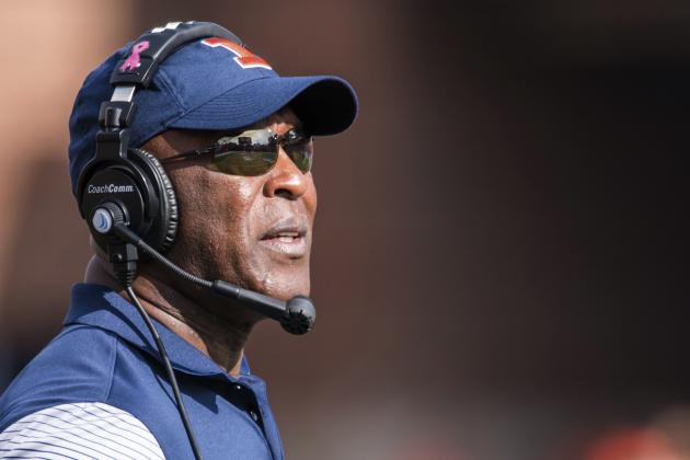 FILE - In this Oct. 29, 2016 file photo, Illinois head coach Lovie Smith looks at the scoreboard during t an NCAA college football game against Minnesota, at Memorial Stadium in Champaign, Ill. As Smith begins his second season of rebuilding the Illinois football program, he is already sure about two things. Junior Chayce Crouch will be his starting quarterback and senior Kendrick Foster will be the team's primary running back. The season opener comes at home on Sept. 2 against Ball State.(AP Photo/Bradley Leeb File)