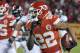 Kansas City Chiefs defensive back Marcus Peters (22) carries ball he stripped from Denver Broncos running back Jamaal Charles, during the first half of an NFL football game in Kansas City, Mo., Monday, Oct. 30, 2017. Peters recovered the ball and ran for a touchdown. (AP Photo/Ed Zurga)