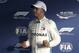 Mercedes driver Lewis Hamilton of Britain pumps his fists after qualifying at the Australian Formula One Grand Prix in Melbourne, Saturday, March 24, 2018. Hamilton has poll ahead of Ferrari driver Sebastian Vettel of Germany and Ferrari driver Kimi Raikkonen of Finland. (AP Photo/Rick Rycroft)