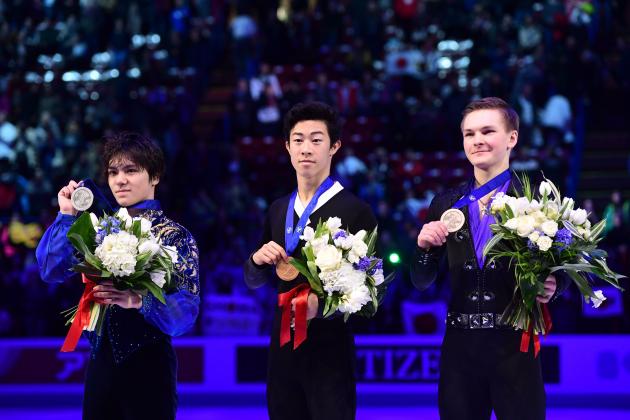 (L-R) Silver medallist Japan's Shoma Uno, gold medallist US Nathan Chen and bronze medallist Russia's Mikhail Kolyada pose on the podium of the Men-Free Skate program at the Milan World Figure Skating Championship 2018 on March 24, 2018. / AFP PHOTO / MIGUEL MEDINA        (Photo credit should read MIGUEL MEDINA/AFP/Getty Images)