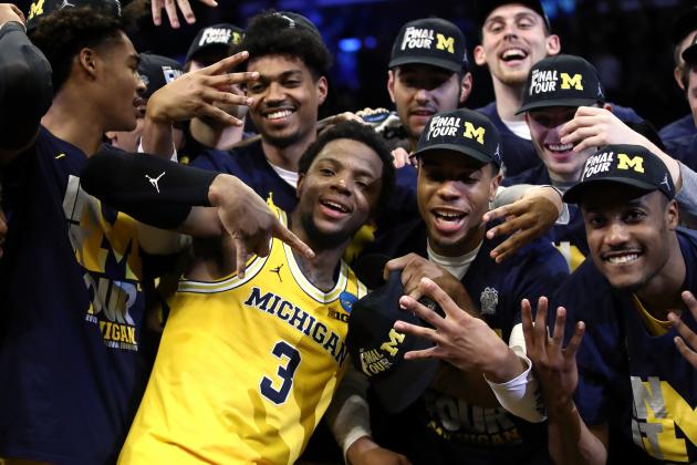 LOS ANGELES, CA - MARCH 24:  Zavier Simpson #3 and the Michigan Wolverines celebrates after defeating the Florida State Seminoles in the 2018 NCAA Men's Basketball Tournament West Regional Final at Staples Center on March 24, 2018 in Los Angeles, California. The Michigan Wolverines defeated the Florida State Seminoles 58-54.  (Photo by Ezra Shaw/Getty Images)