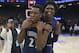 Serra forward Onyeka Okongwu, left, is hugged by teammate Ofure Ujadghele after defeating Las Lomas 73-68 in the boy's Division I high school championship basketball game Friday, March 23, 2018, in Sacramento, Calif. (AP Photo/Rich Pedroncelli)
