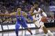 Kansas' Malik Newman (14) heads to the basket around Duke's Trevon Duval (1) during the first half of a regional final game in the NCAA men's college basketball tournament Sunday, March 25, 2018, in Omaha, Neb. (AP Photo/Nati Harnik)
