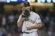 LOS ANGELES, CA - SEPTEMBER 23: Starting pitcher Madison Bumgarner #40 of the San Francisco Giants reacts after giving up a home run to Austin Barnes #15 of the Los Angeles Dodgers in the eighth inning at Dodger Stadium on September 23, 2017 in Los Angeles, California. (Photo by Stephen Dunn/Getty Images)