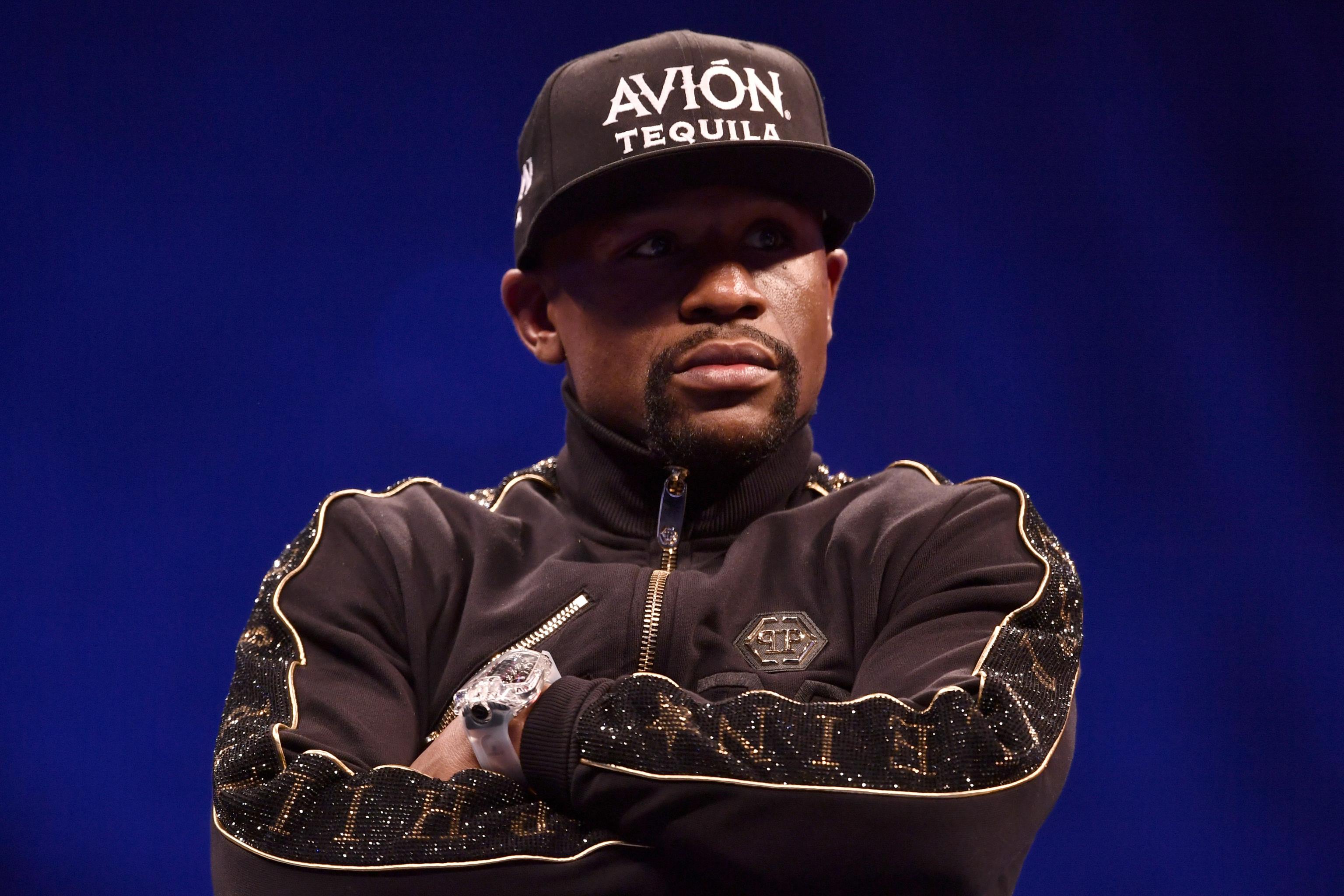 Floyd Mayweather Jr. T.I. Fight Over Rapper's Wife: Boxer Apologizes