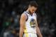 Golden State Warriors guard Stephen Curry reacts at the end of the team's NBA basketball game against the Denver Nuggets on Saturday, Feb. 3, 2018, in Denver. The Nuggets won 115-108. (AP Photo/David Zalubowski)