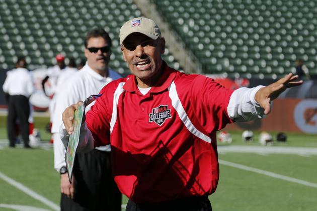 Coaches Herm Edwards talks with his players during the NFLPA Collegiate Bowl American team practice on Friday, Jan. 18, 2013 in Carson, Calif. (Ric Tapia/AP Images for NFLPA)