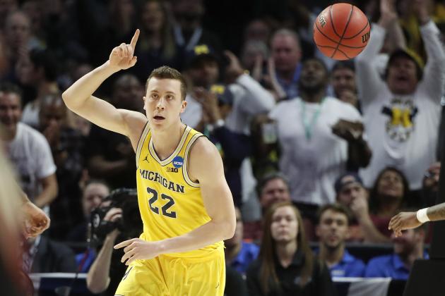 Michigan guard Duncan Robinson gestures after scoring during the second half of the team's NCAA men's college basketball tournament regional final against Florida State on Saturday, March 24, 2018, in Los Angeles. (AP Photo/Jae Hong)